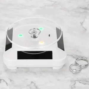 360 Degrees Solar Showcase Rotating Turntable Watch Phone Jewelry Display Stand LED Light for Watch Phone Jewelry Ring (plastic)